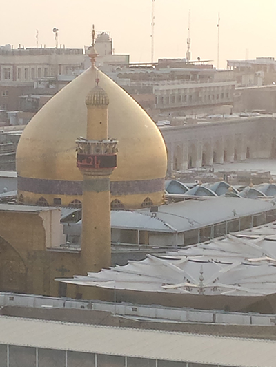 Figure 2: Imam Ali shrine gold plated dome and minaret dominate Najaf's skyline